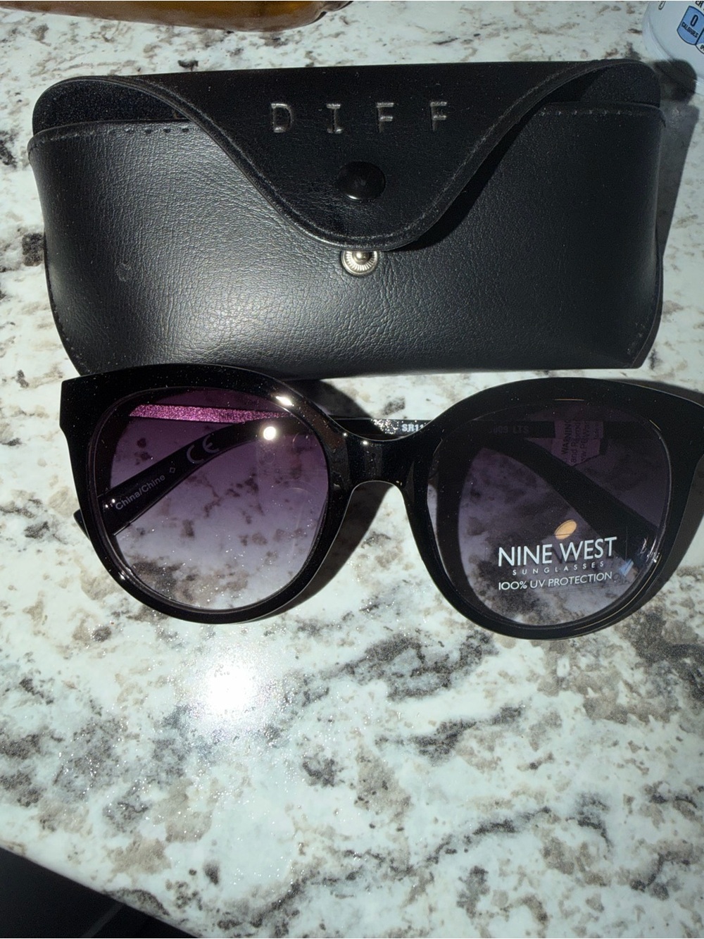 Nine West Black Frame Sunglasses with Purple Gradient Lenses